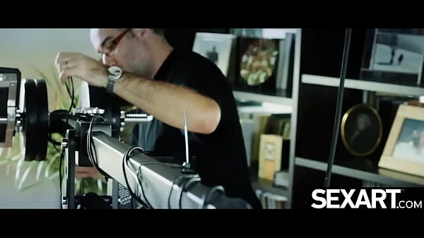 Sexy model sucks and rides her lover's cock behind the scenes