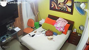 Latina brunette undresses after shower caught on cam